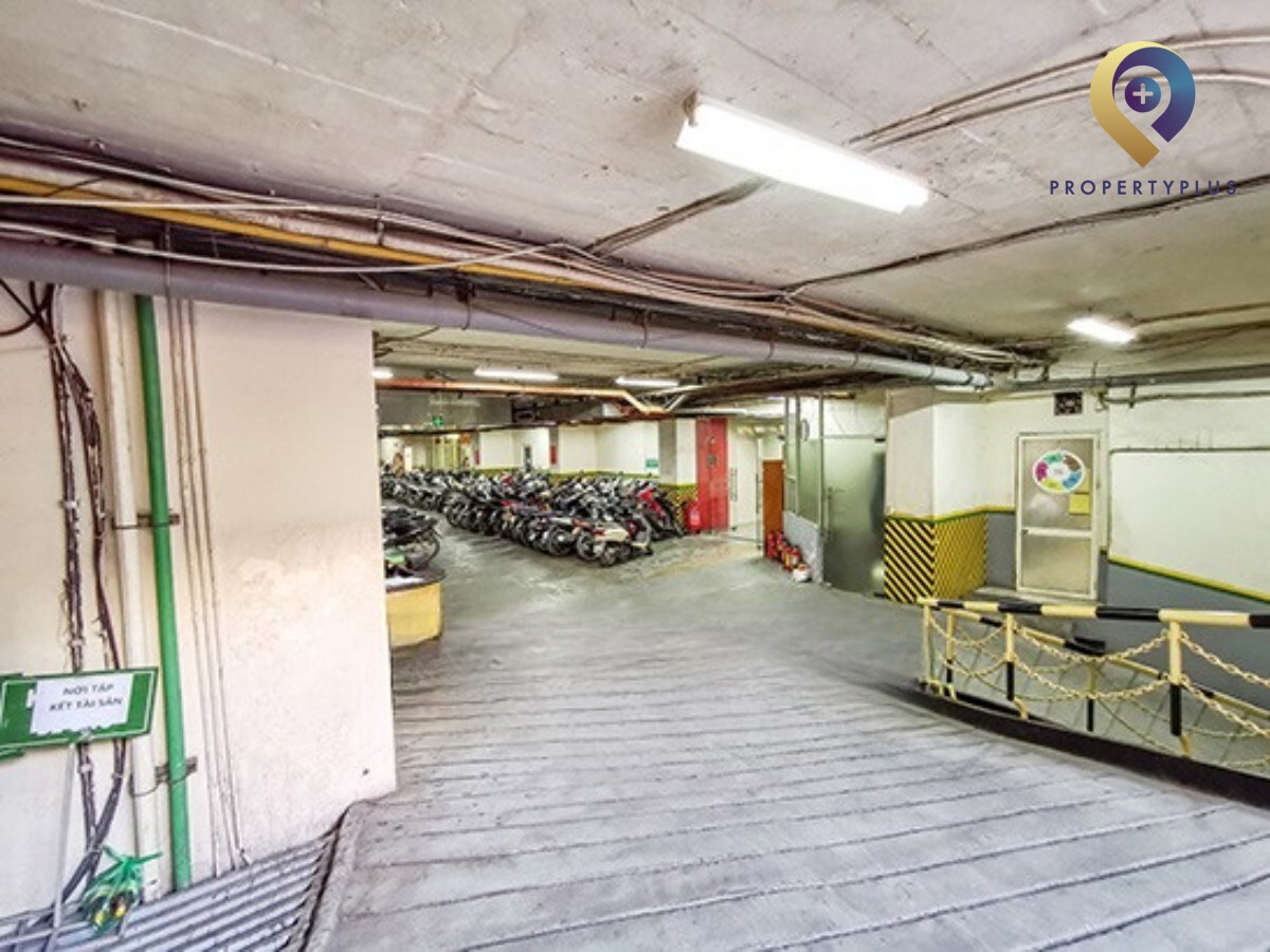 Underground parking area of Ruby Plaza with spacious and secure vehicle storage.
